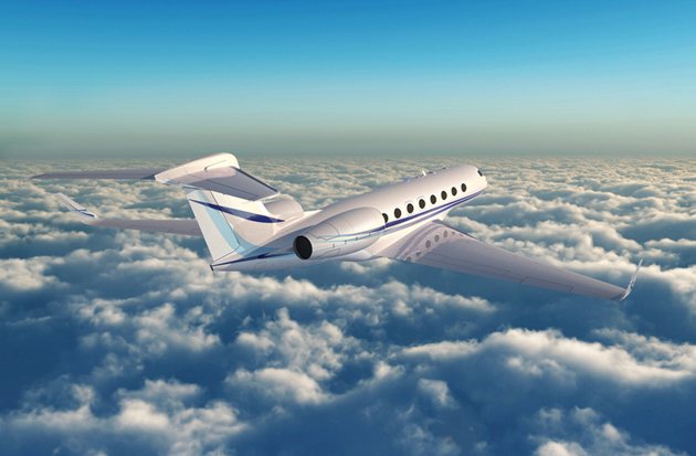 Gulfstream private jet above the clouds