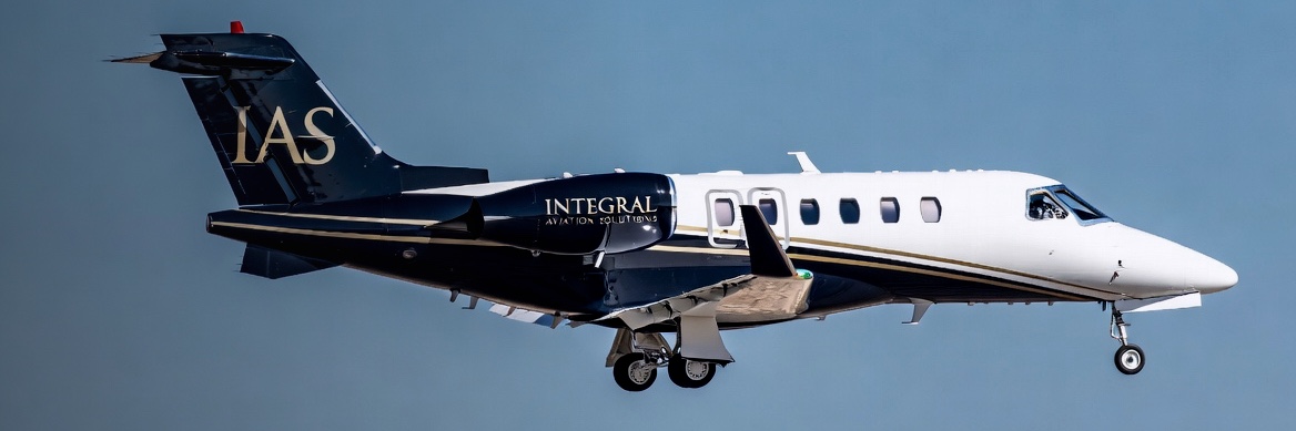 Cessna Citation in Integral Aviation Solutions livery in flight — Citation series acquisition advisory